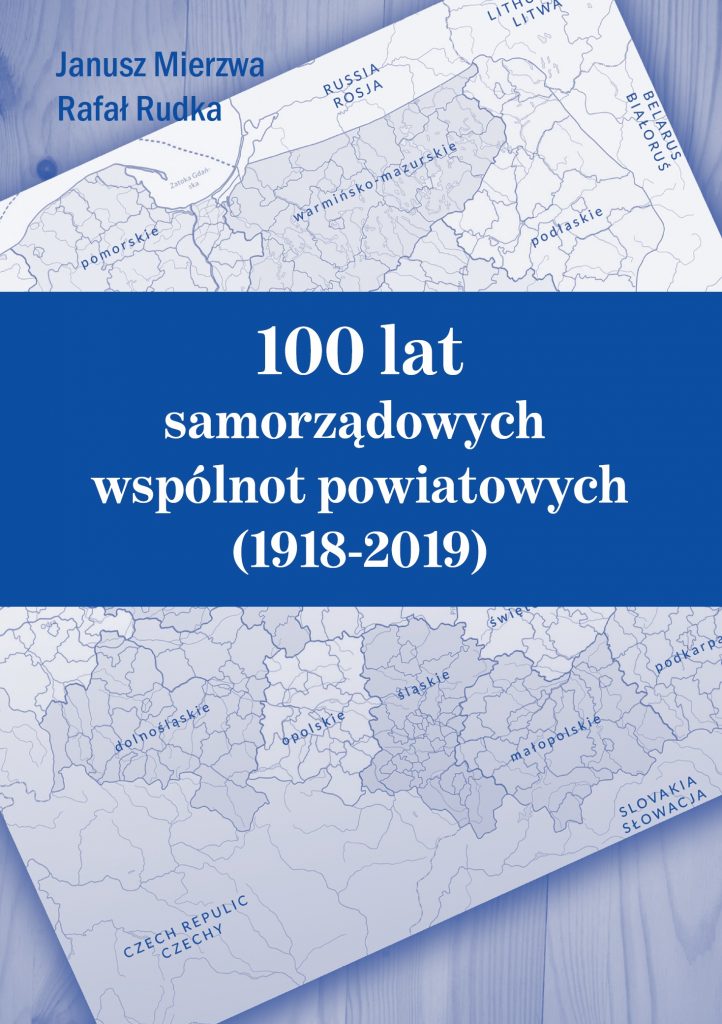 niebieska okładka z administracyjną mapą polski w tle, na środku pasek z tytułem
