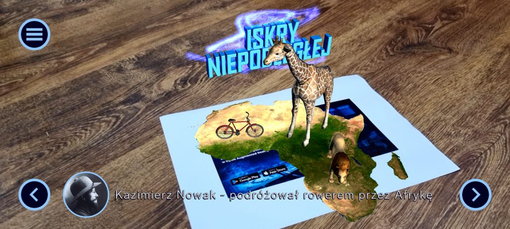 na kartce z biletem nałożona warsztwa rozszerzonej rzeczywistości z żyrafą, rowerem i mapą Afryki